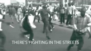 ManLiftingBanner – FIGHTING IN THE STREETS