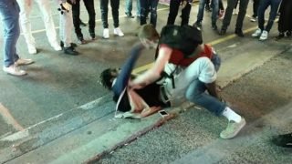 STREET BRAWL: 1 GUY FIGHTS OFF 5 PEOPLE AT ONCE! (MUST WATCH!!!)