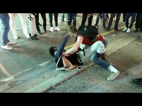 STREET BRAWL: 1 GUY FIGHTS OFF 5 PEOPLE AT ONCE! (MUST WATCH!!!)